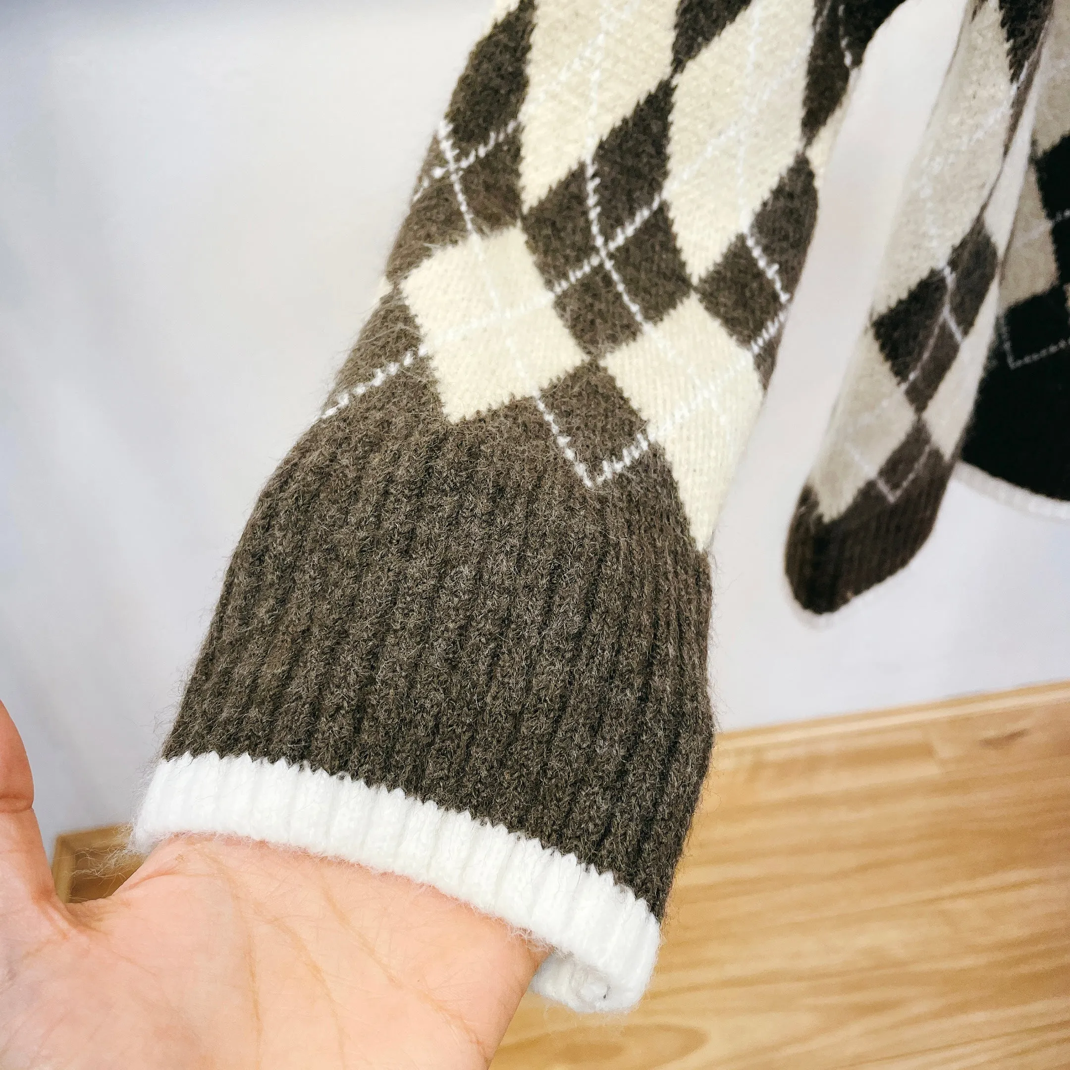 Checked pattern knitted wool jumpers